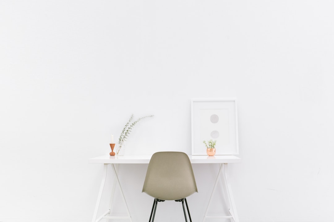 A tidy and organized living space with minimal decor, showcasing efficient use of space and time-saving elements.