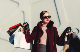 A person thoughtfully examining products in a grocery store or market, showcasing the process of making informed purchasing choices.