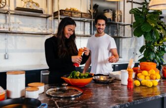 A well-organized kitchen with cooking tools and ingredients ready for meal preparation.