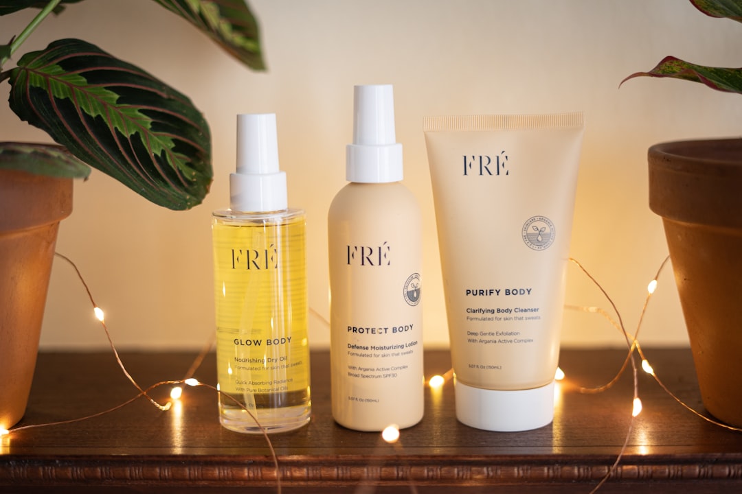 A serene flat lay of skincare products, including moisturizers, serums, and natural ingredients, arranged aesthetically on a light background.